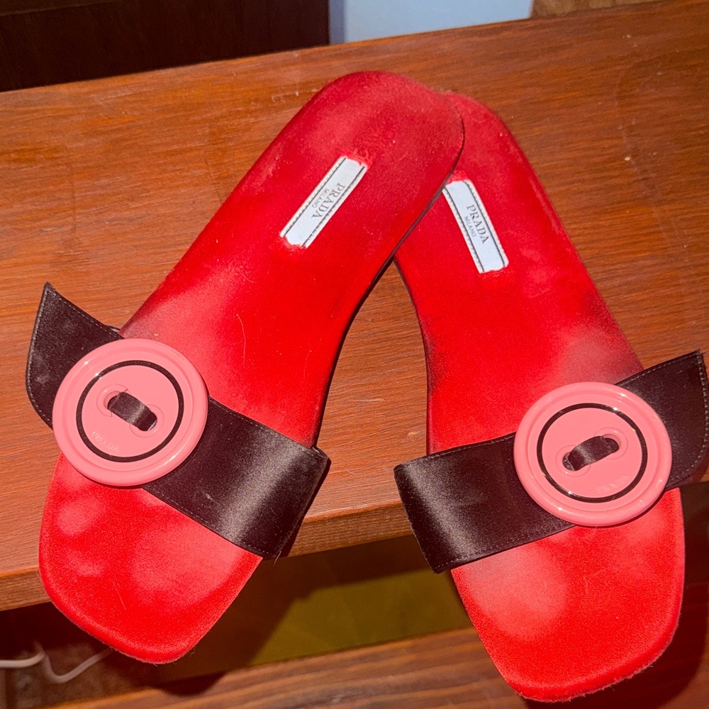 Prada sandals with satin black strap and oversized pink button. Reposhing.